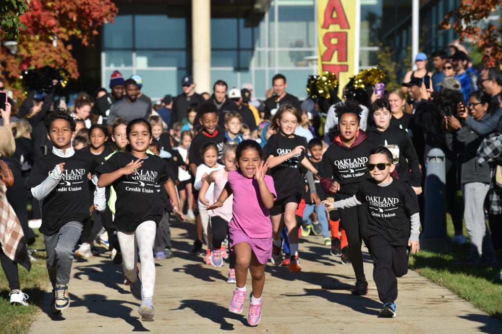 Runners at the 2026 KARMA jack Golden Grizzlies Festival of Races at Oakland University